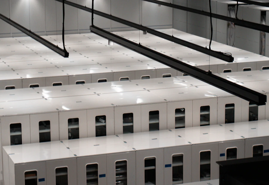 Rows of white server cabinets in a data centre